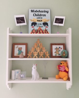 Upcycled shelves displaying various small items including Peter Rabbit 50 pence coin