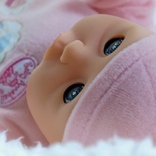 Baby doll dressed in pink