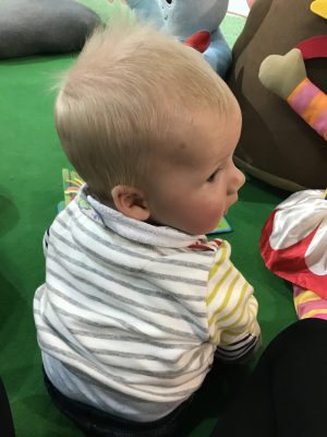 Tall Boy sitting unaided