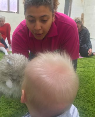 Tall Boy meeting a cat hand puppet