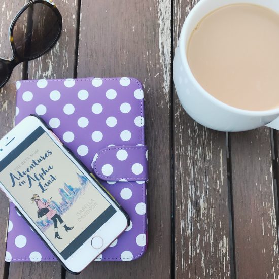 The Beta Mum on iPhone with a cup of tea