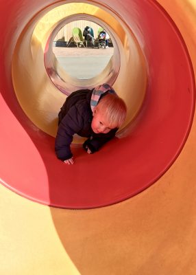 Crawling through a tunnel at the Ice Cream Farm